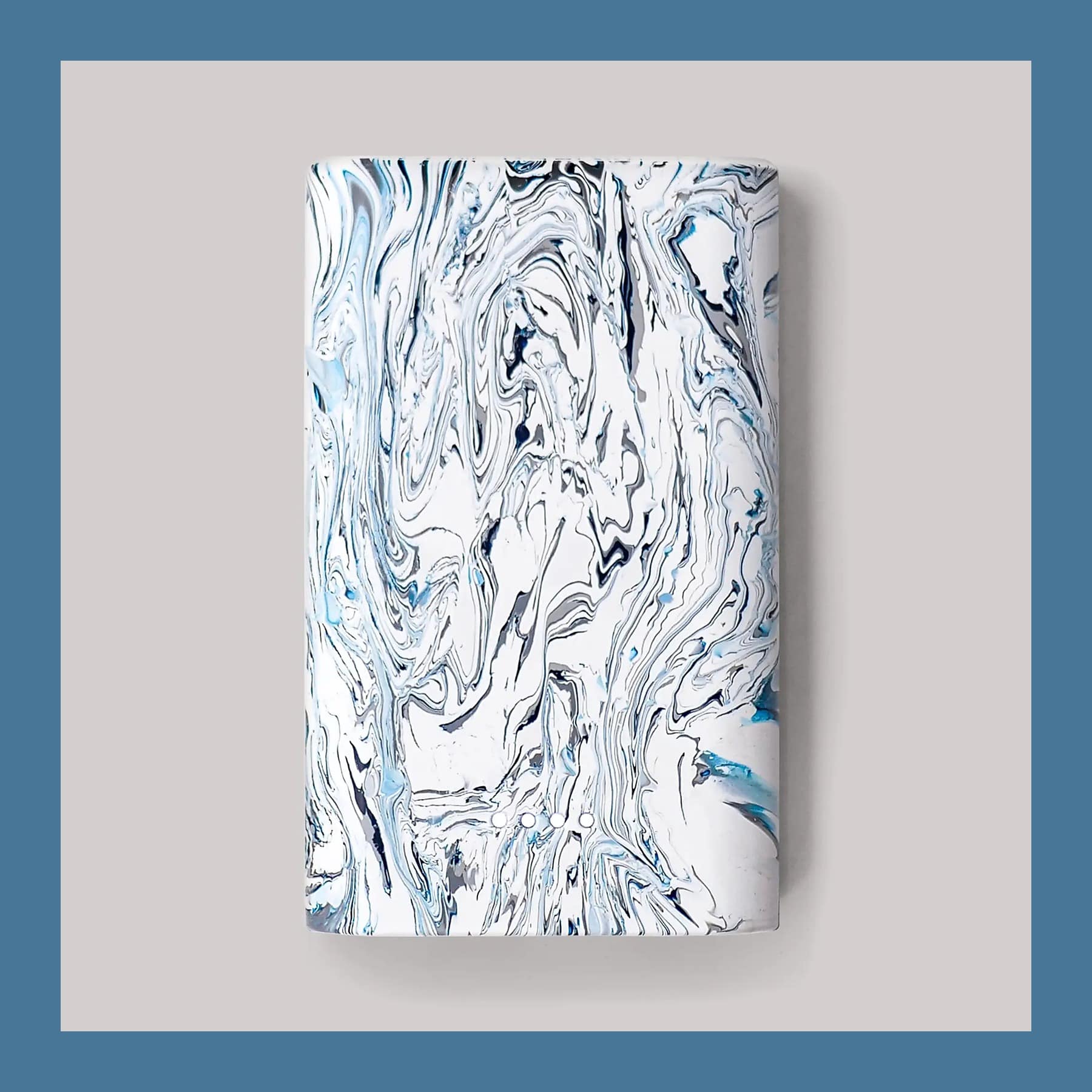 gomi 10,000mAh power bank with a blue and white marbled recycled plastic case, on a grey ground
