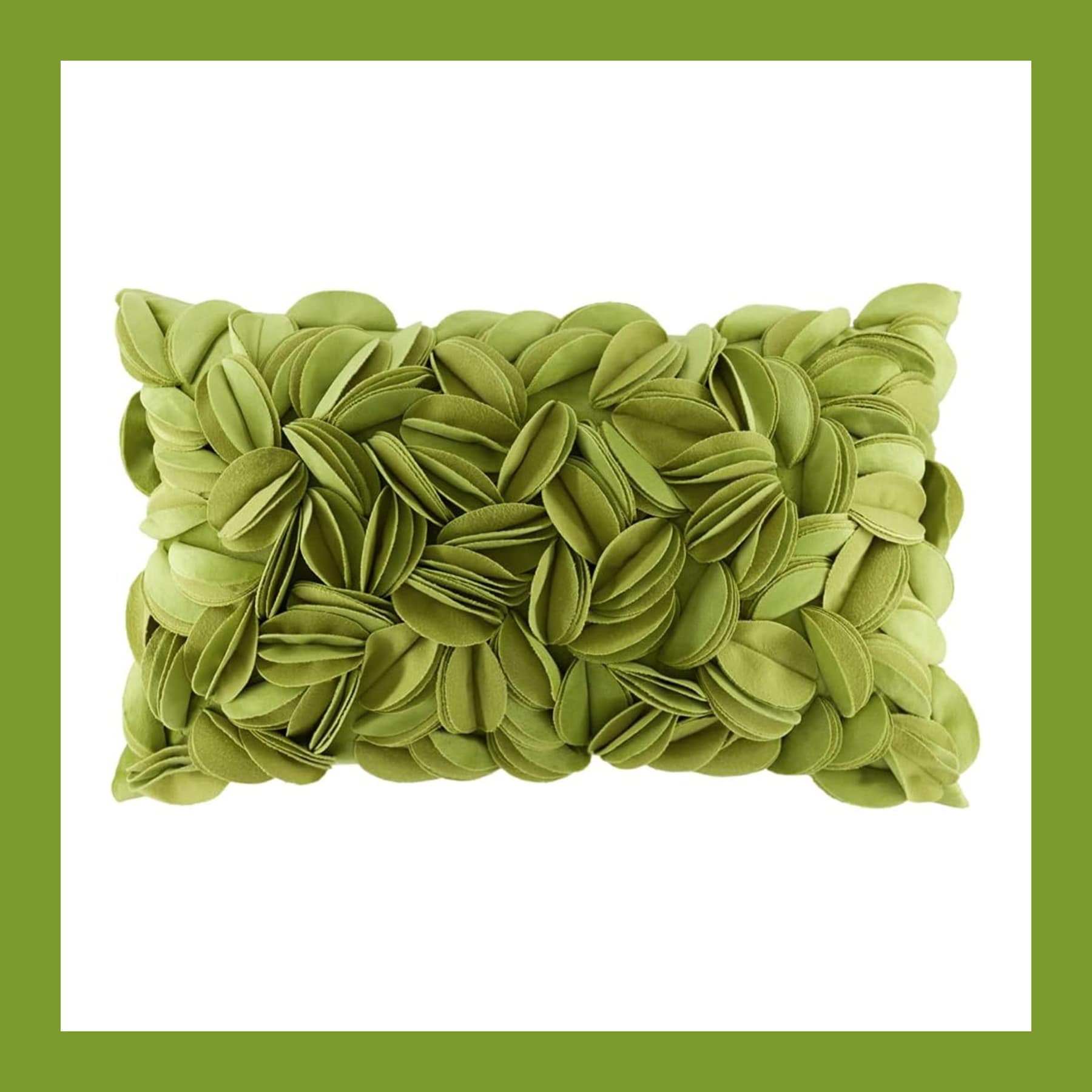 Green velvet lumbar cushion covered in layers of round fabric petals