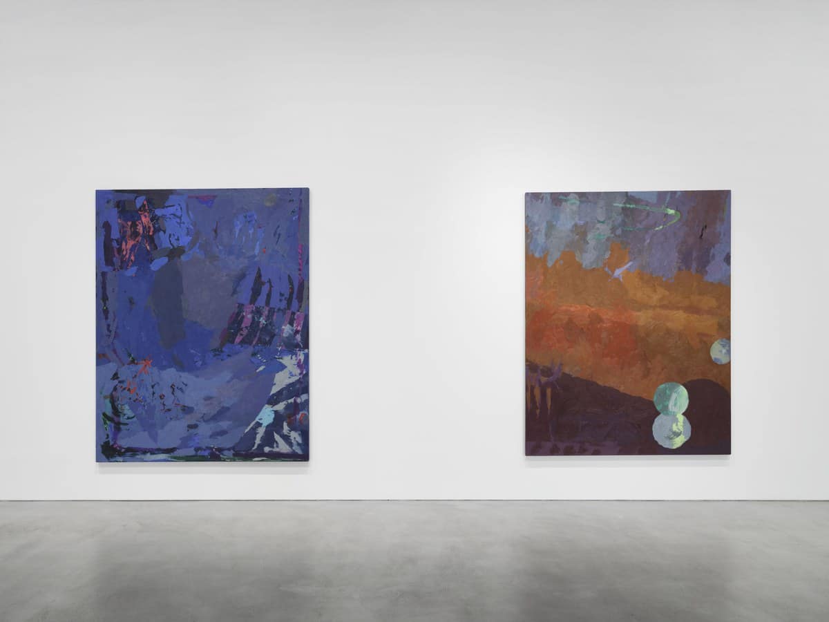 Two large abstract paintings by Mary Ramsden in blue, orange and violet on white walls at Pilar Corrias