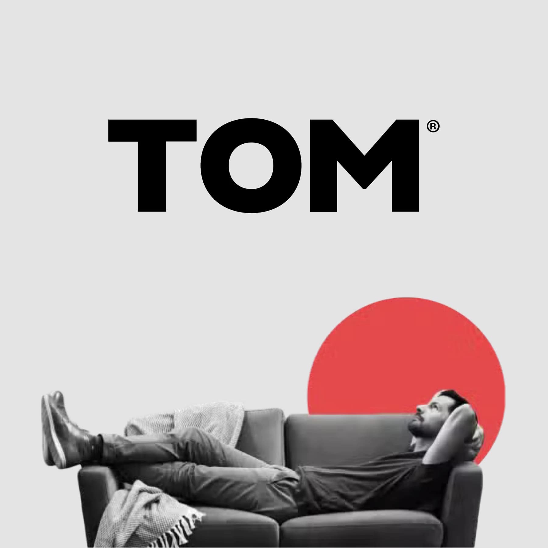 Tom Life Insurance logo with relaxed man on sofa