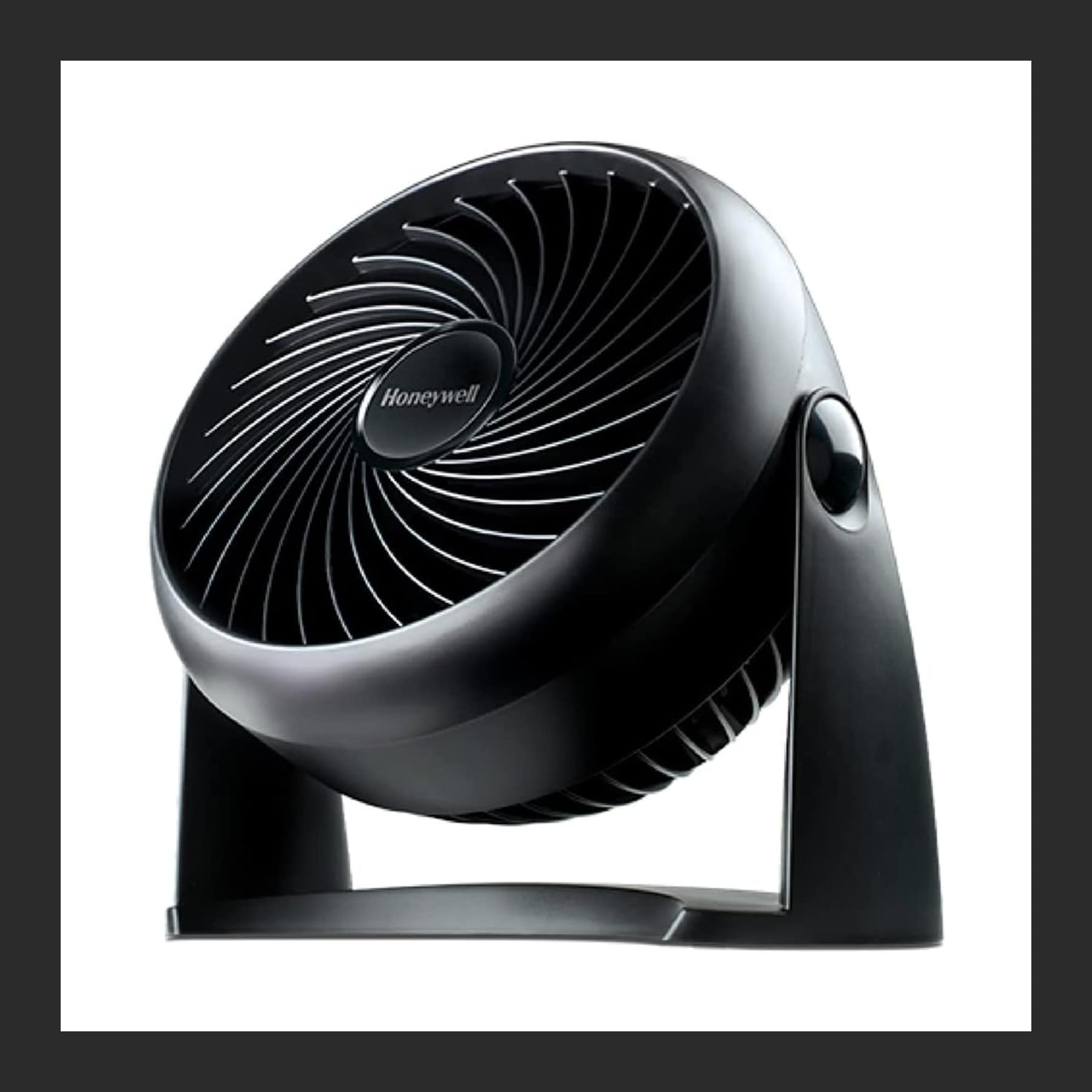 Black Honeywell TurboForce desk fan with a round turbine-style grille on a tilting stand