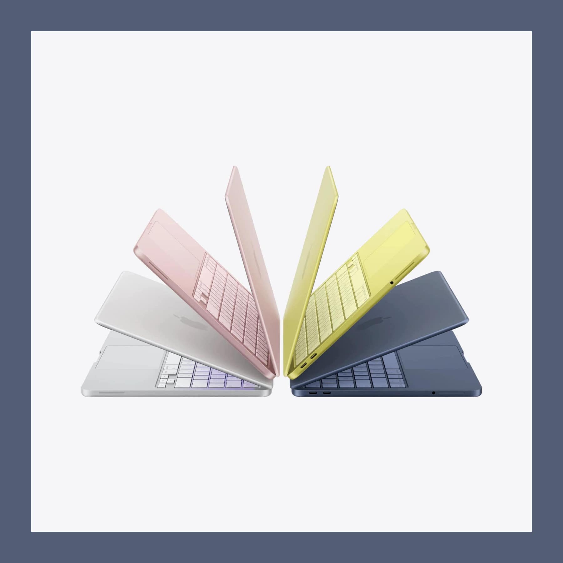 Four MacBook Neo laptops fanned open in Silver, Blush, Citrus and Indigo, on a pale grey ground with an indigo border.
