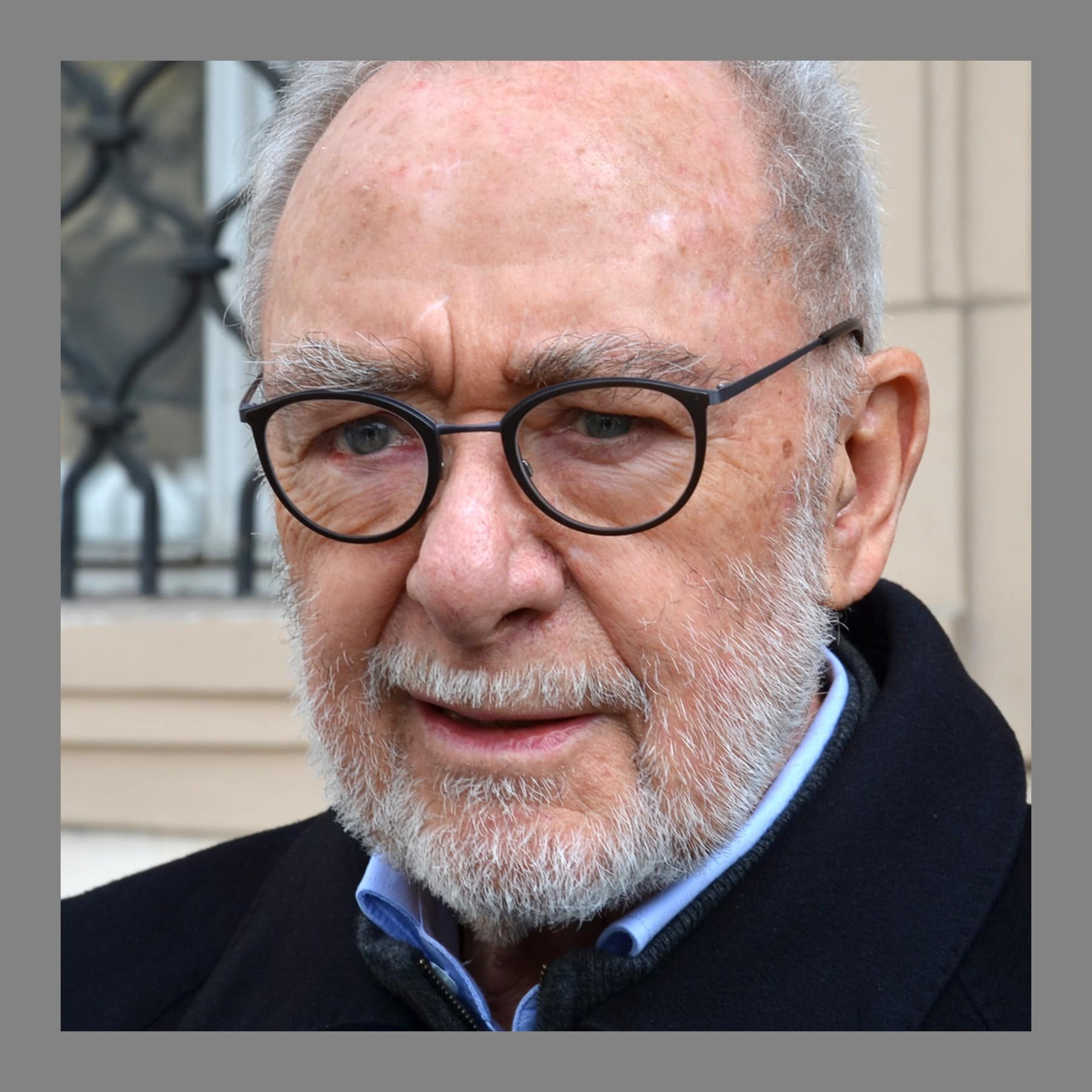 Close portrait of Gerhard Richter in glasses