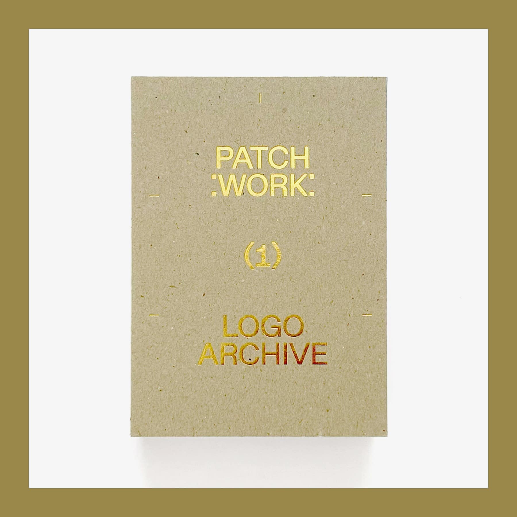 Patch:Work Logo Archive standing upright, a small greyboard book with the title blocked in gold foil