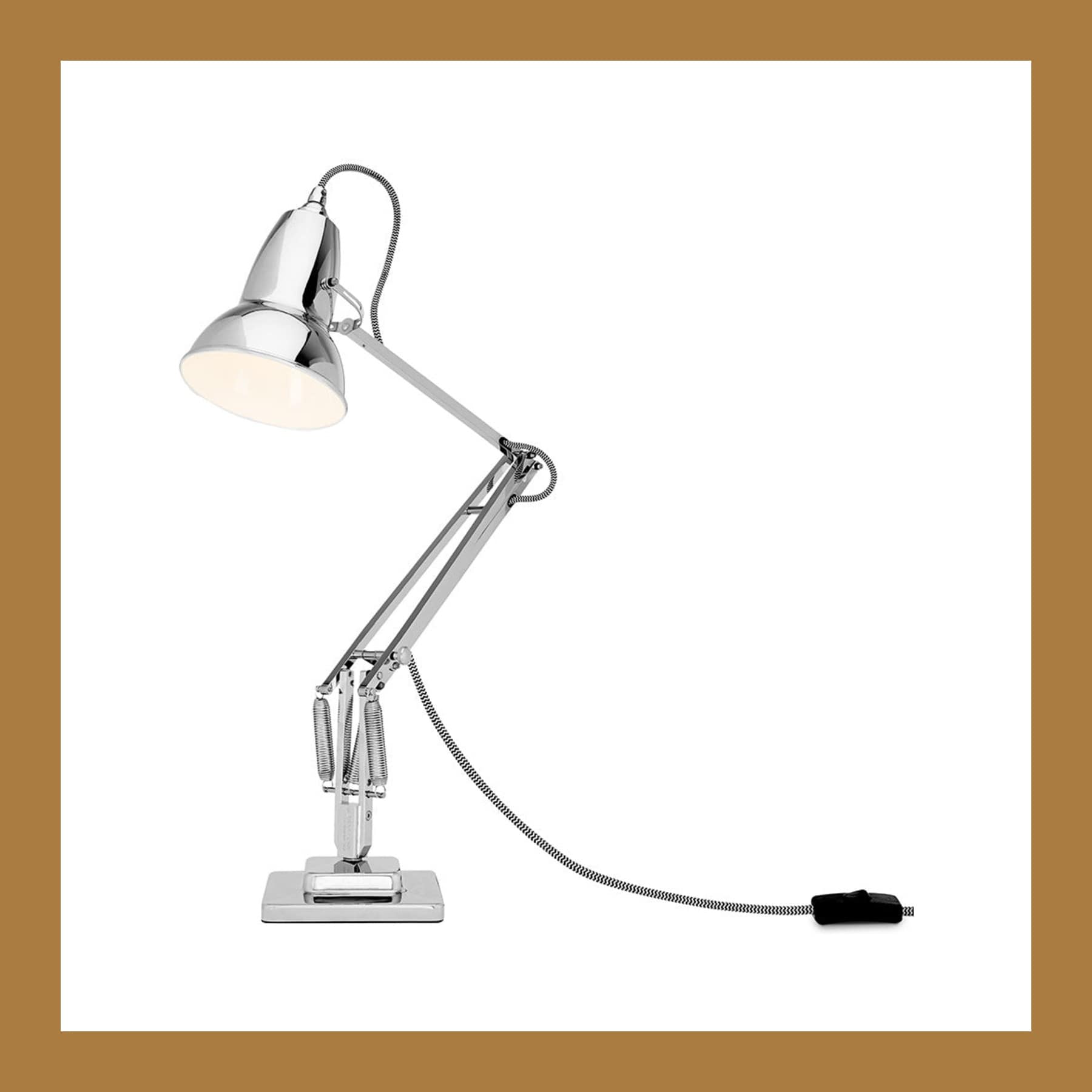 Anglepoise Original 1227 desk lamp in Bright Chrome, arm extended, with its braided cable and inline switch