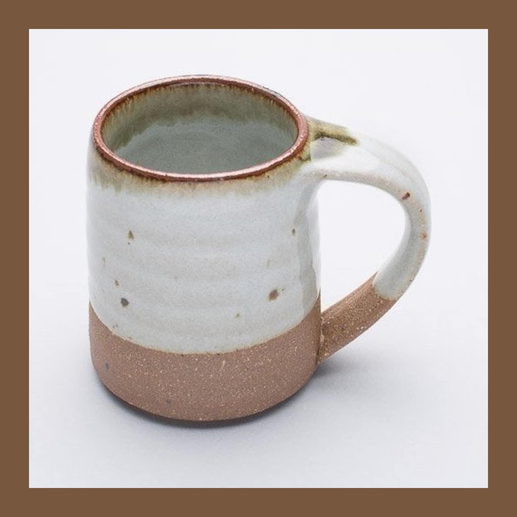 Leach Pottery Standard Ware small mug in cream Dolomite glaze with an unglazed clay foot