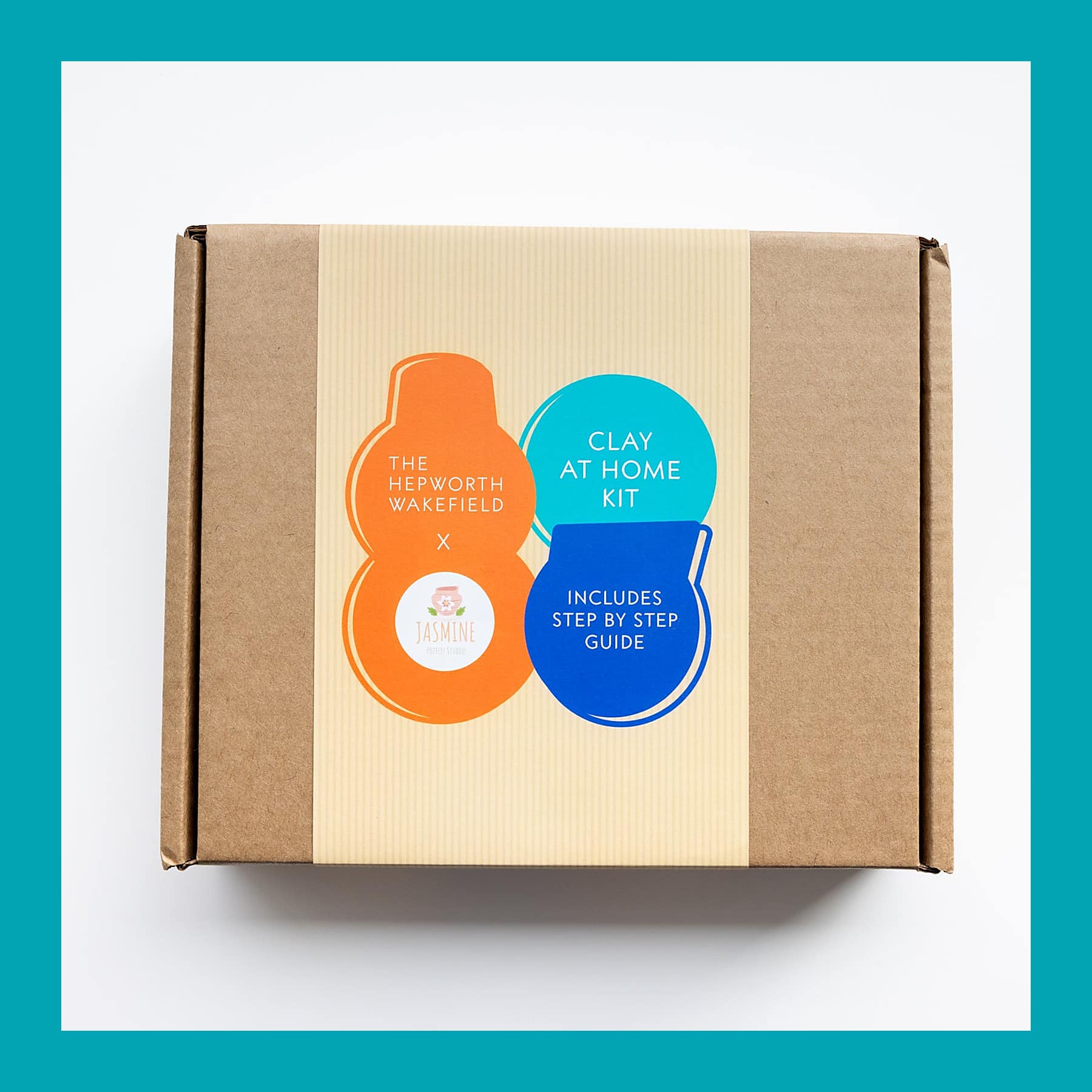 Kraft postal box with an orange, teal and blue printed band reading The Hepworth Wakefield x Jasmine, Clay at Home Kit.