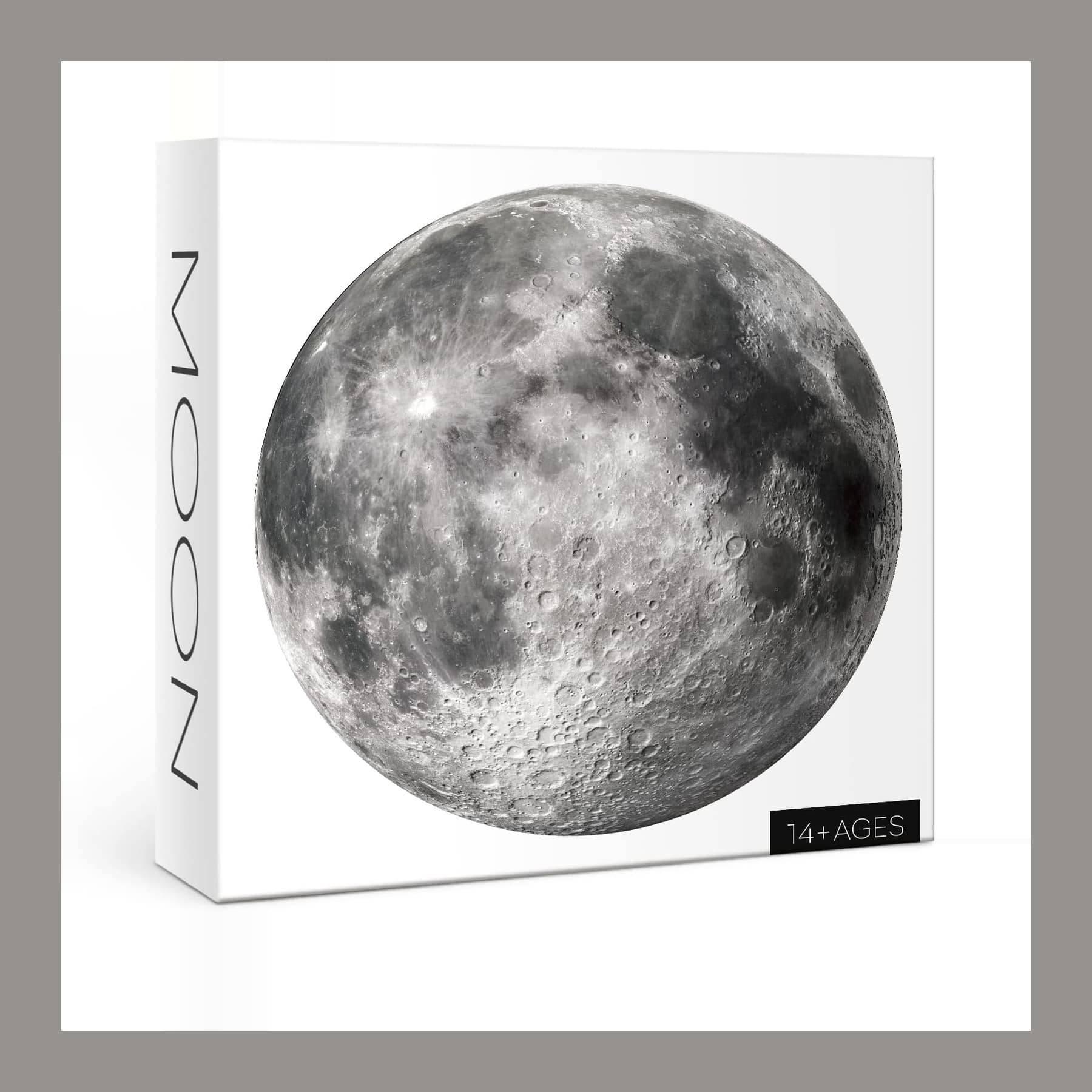 Round 1000-piece moon jigsaw puzzle in front of its white MOON box