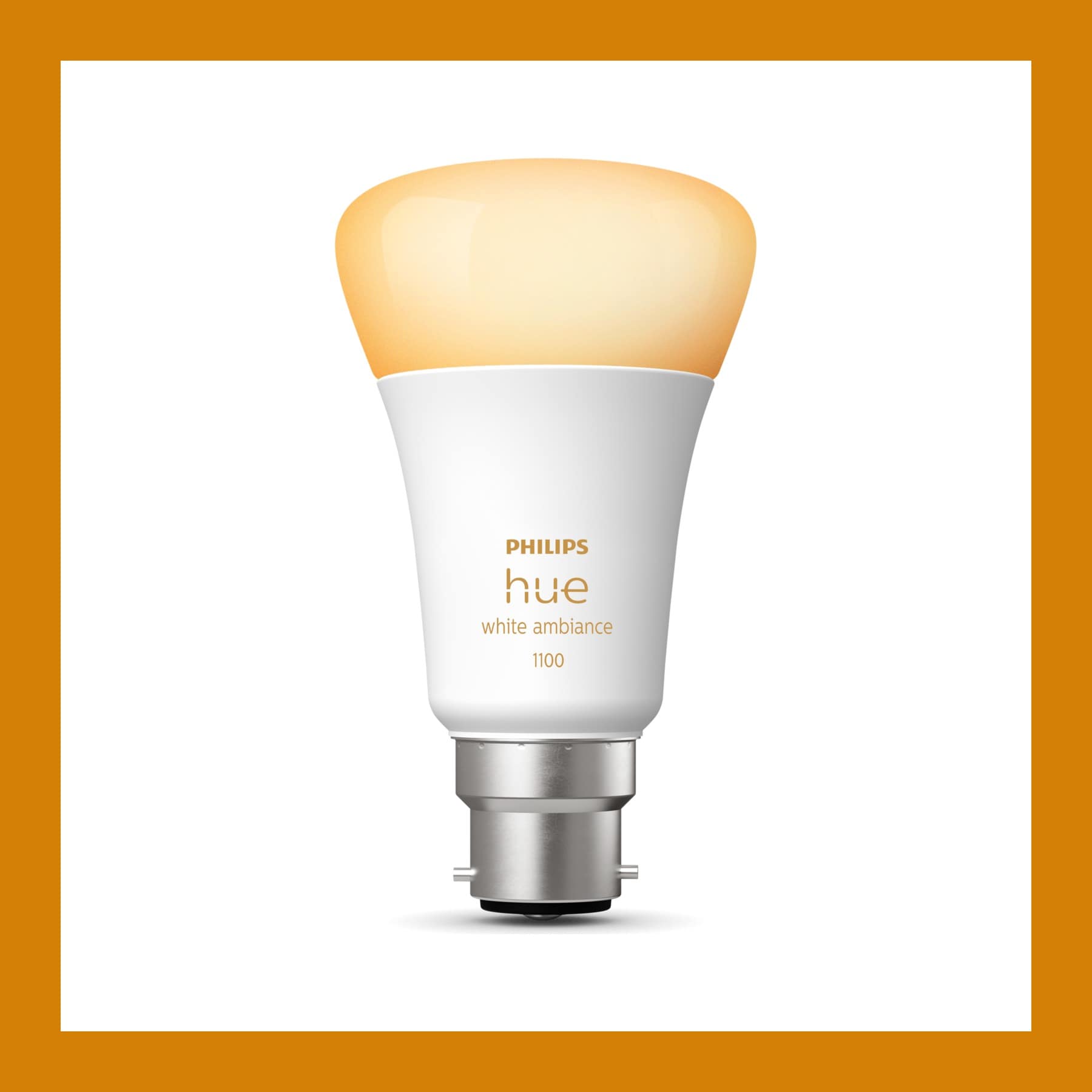 Philips Hue White Ambiance B22 smart bulb with a bayonet cap on a grey background