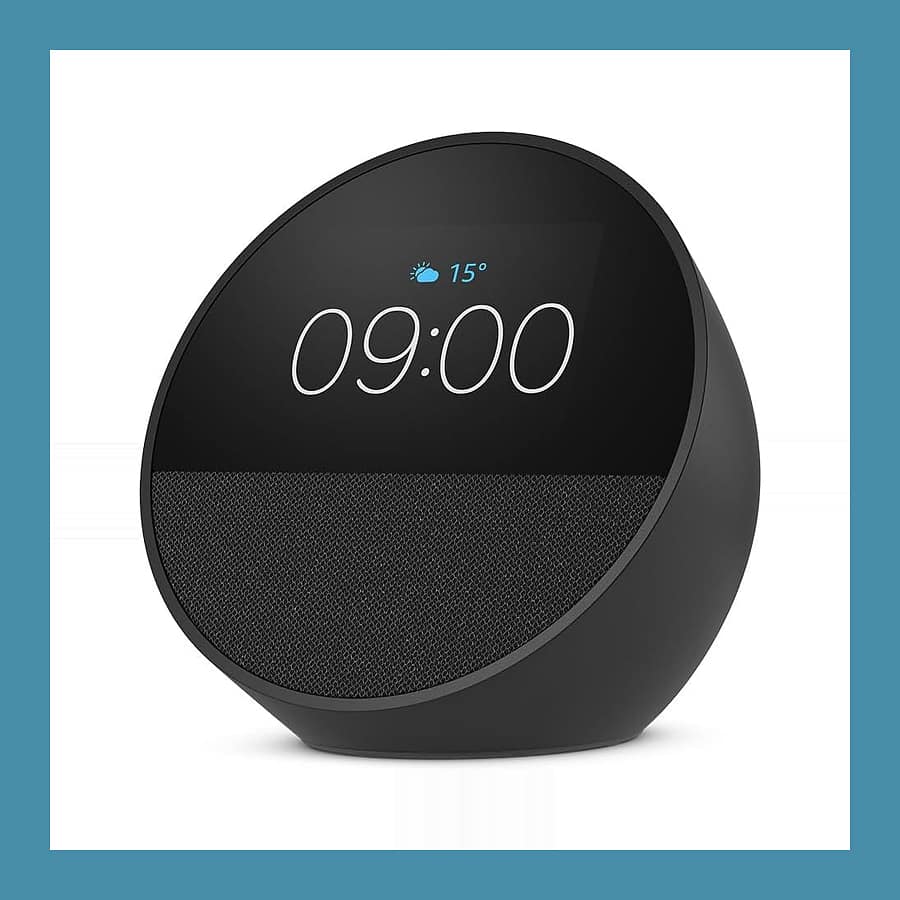 Amazon Echo Spot smart alarm clock in black showing 09:00 on its round screen