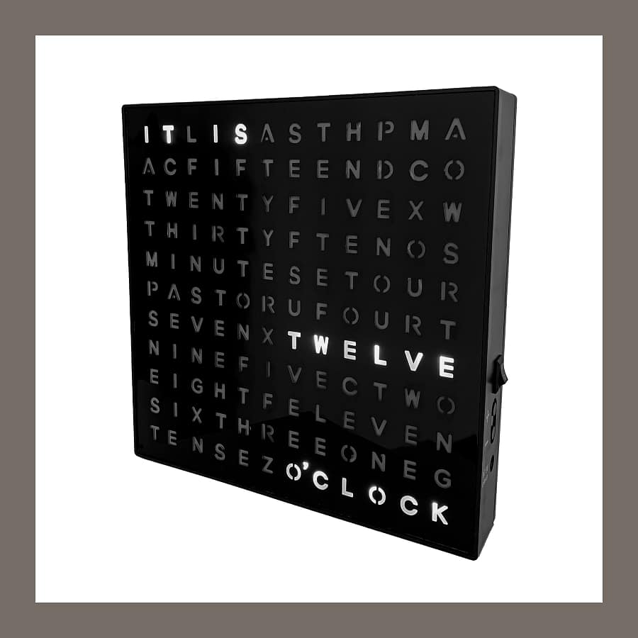 Menkind #Winning LED word clock in a black frame, spelling out the time in lit words