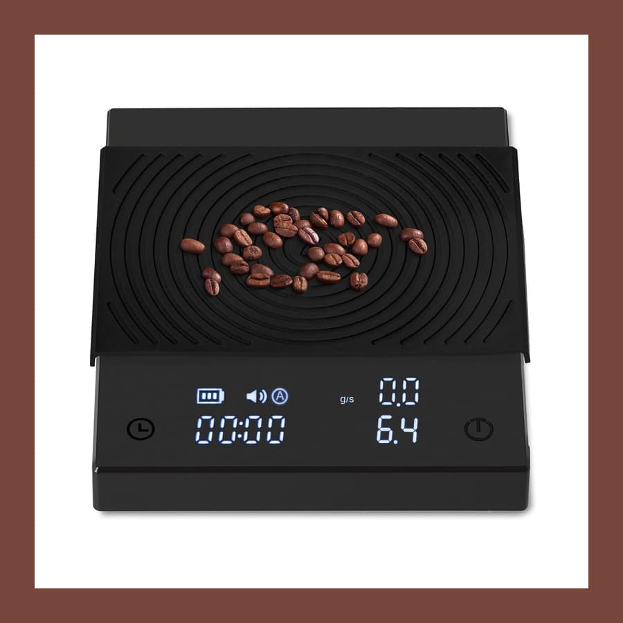 Timemore Black Mirror Basic 2 coffee scale in black, beans resting on the ridged top plate and the timer display lit