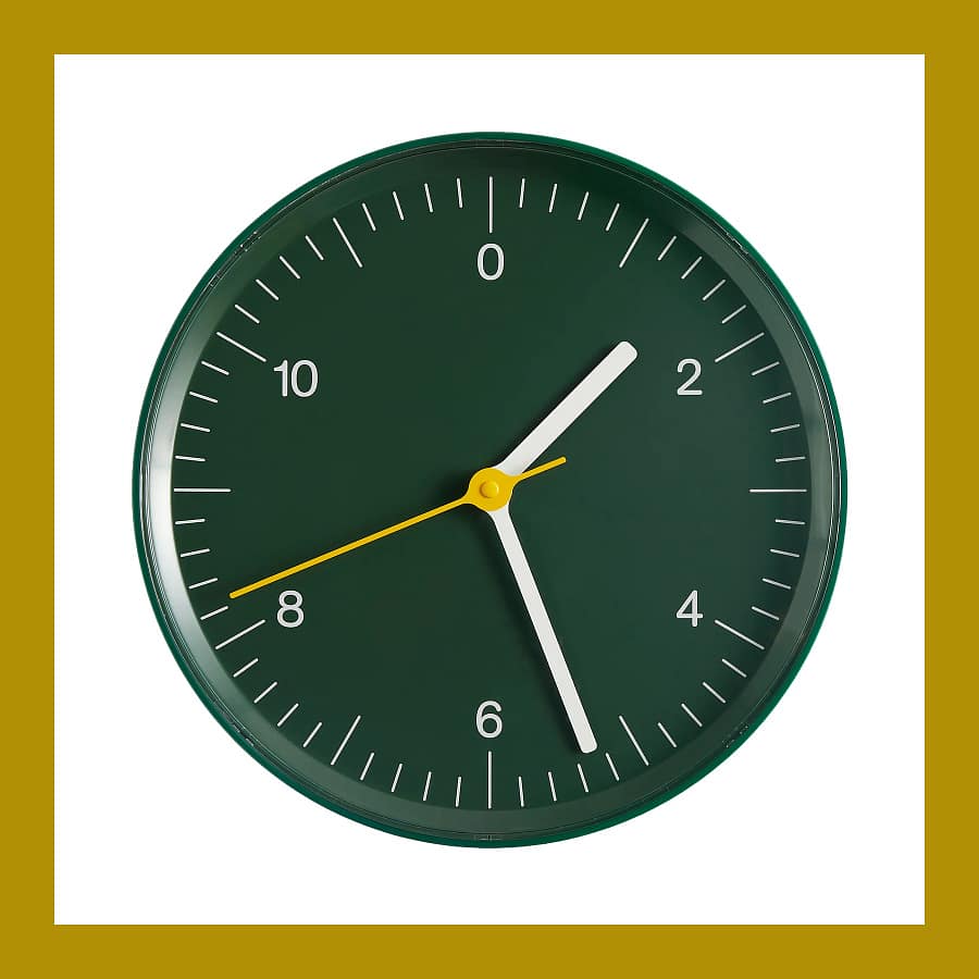 HAY Wall Clock by Jasper Morrison in green with white hands and a yellow second hand