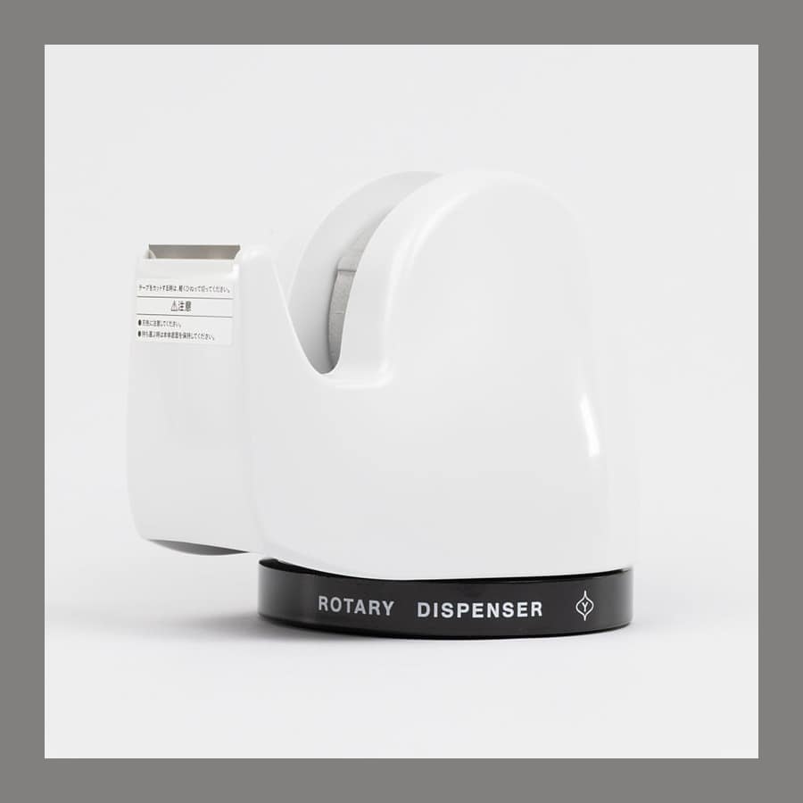 White Kokuyo x Yanagi Sori rotary tape dispenser on a black base