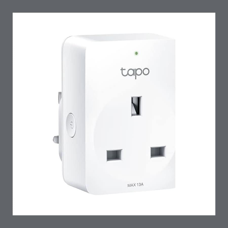 White Tapo P110M smart plug with a UK socket