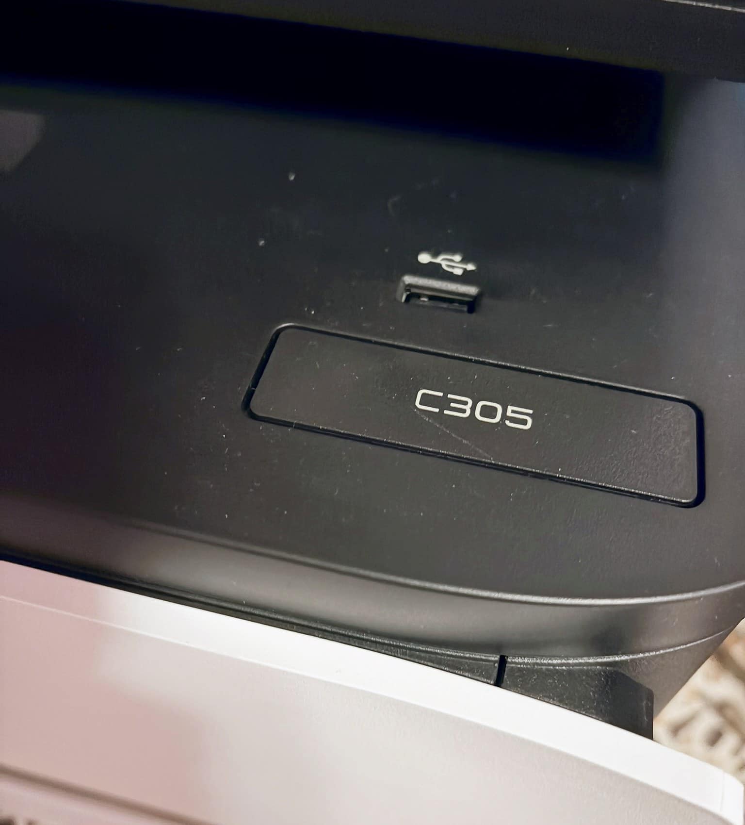 C305 model badge and front USB port on the top of the Xerox C305ae