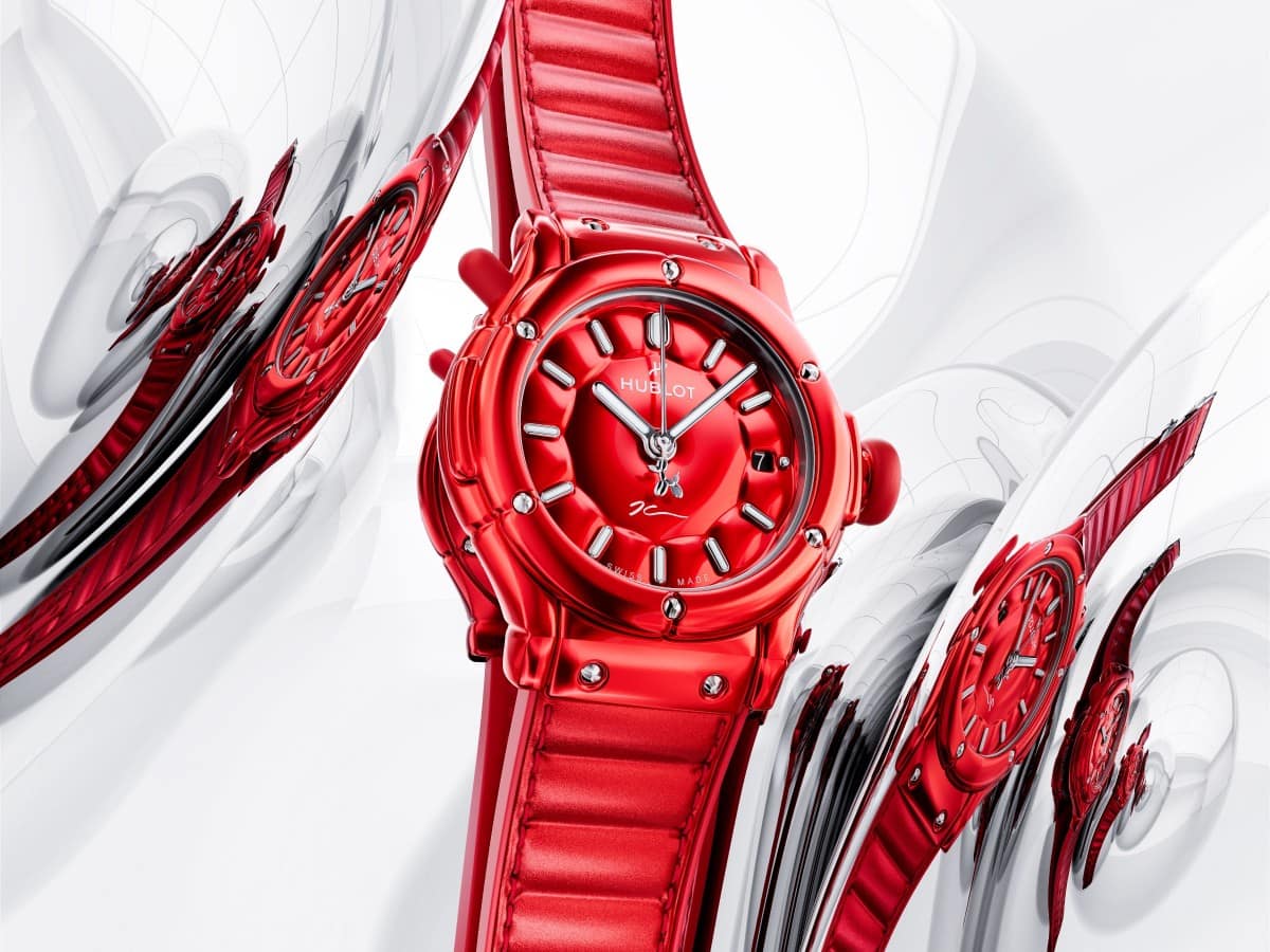 Red Hublot Classic Fusion Balloon Dog watch with a padded red strap against white balloon shapes