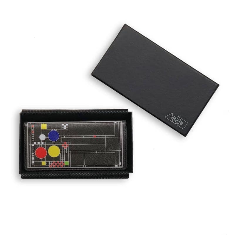 The Frank Lloyd Wright Playhouse wallet resting in its open black Acme box, with the lid beside it