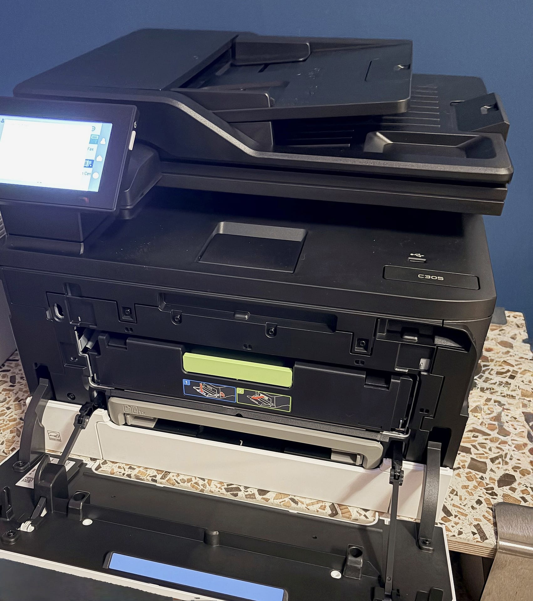 Xerox C305ae with the front door folded down showing the green toner drawer handle