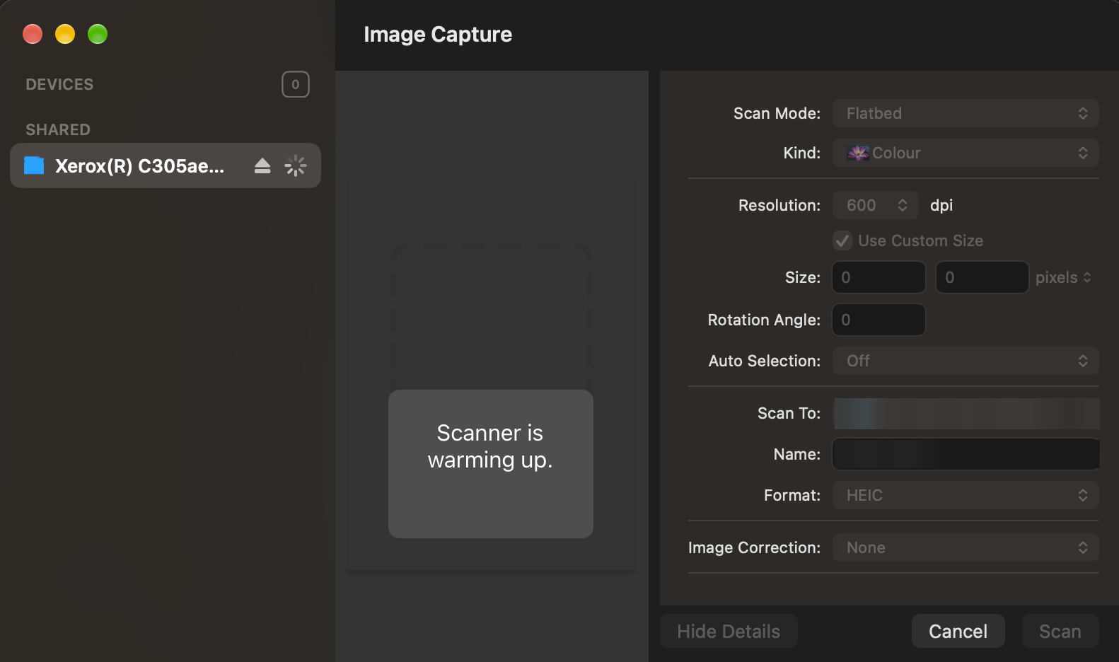 Image Capture on a Mac with the Xerox C305ae listed as a shared scanner warming up