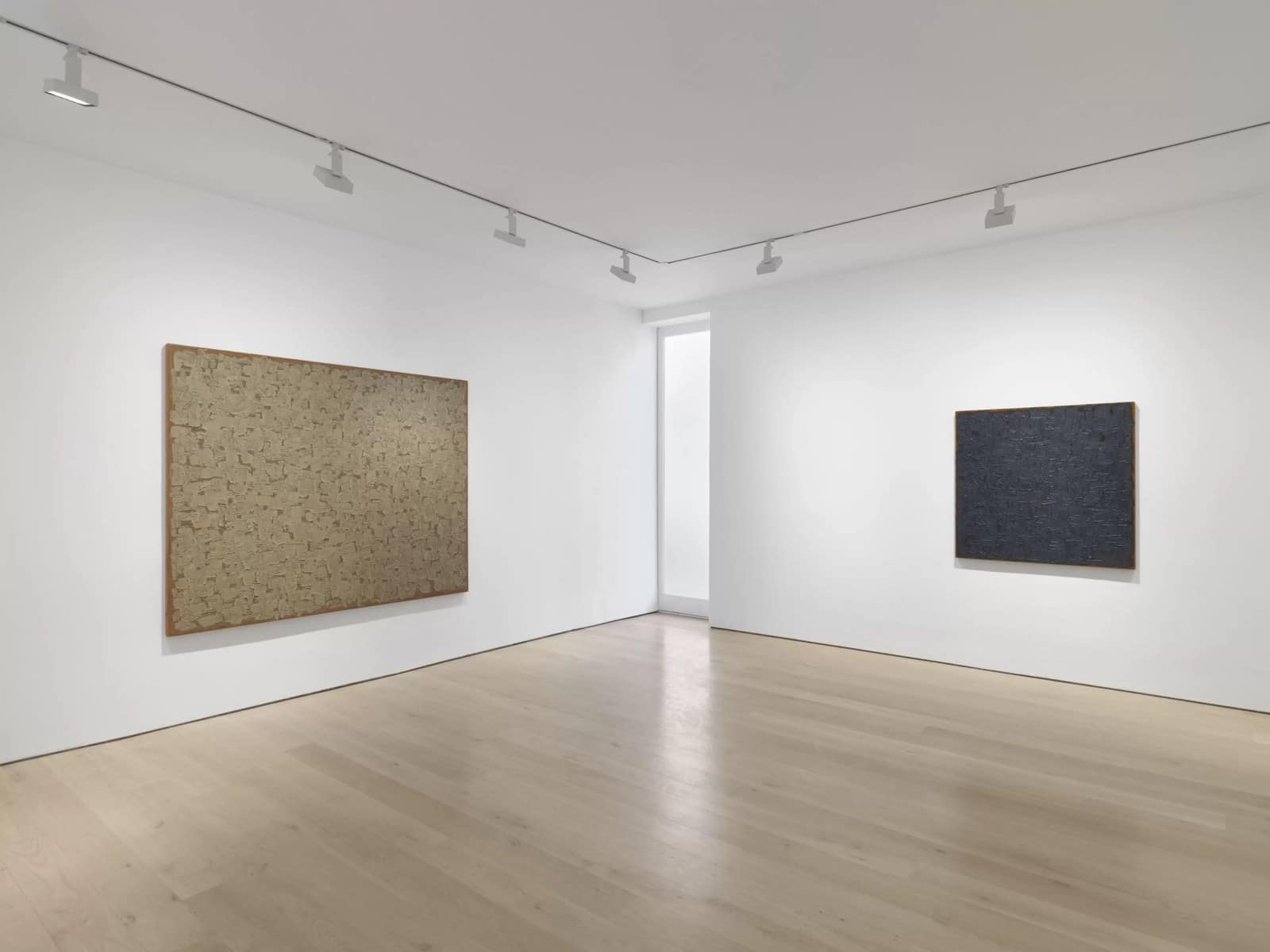 Two Ha Chong-Hyun Conjunction paintings, one in earthy brown and one in dark blue, at Lisson London