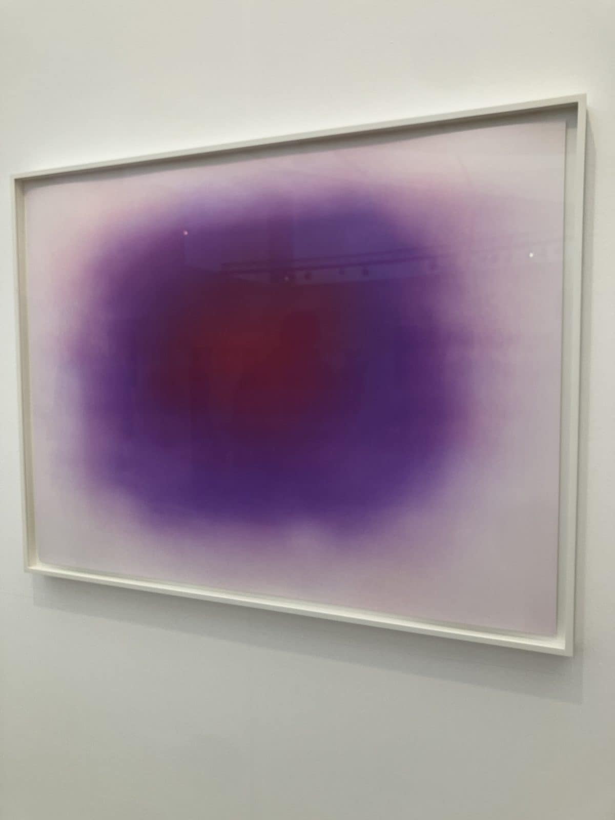 Anish Kapoor etching 02 from Flow Blue, a purple and red glow in a white frame