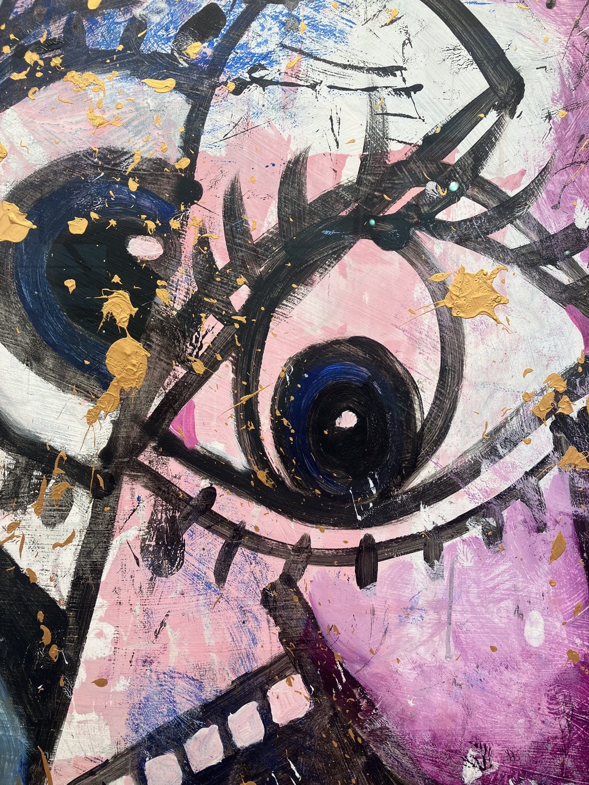 Close-up of the eye and gold paint splashes in George Condo American Insanity