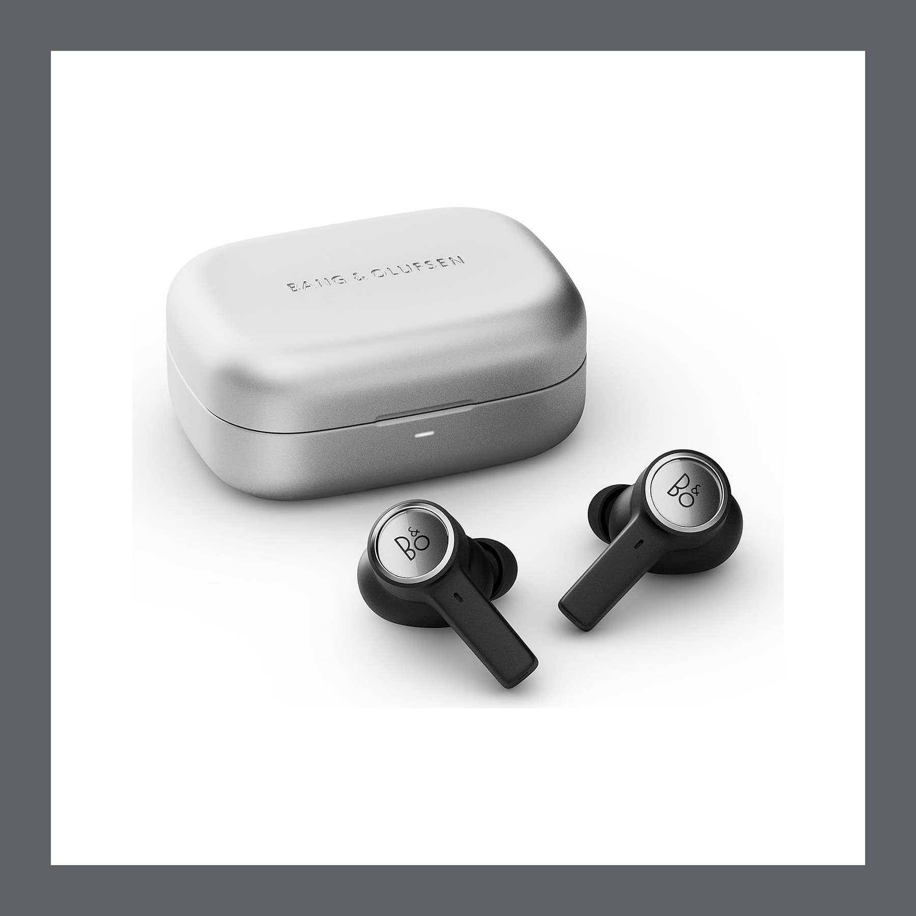 Bang & Olufsen Beoplay Eleven wireless earbuds in Natural Aluminium beside their aluminium charging case