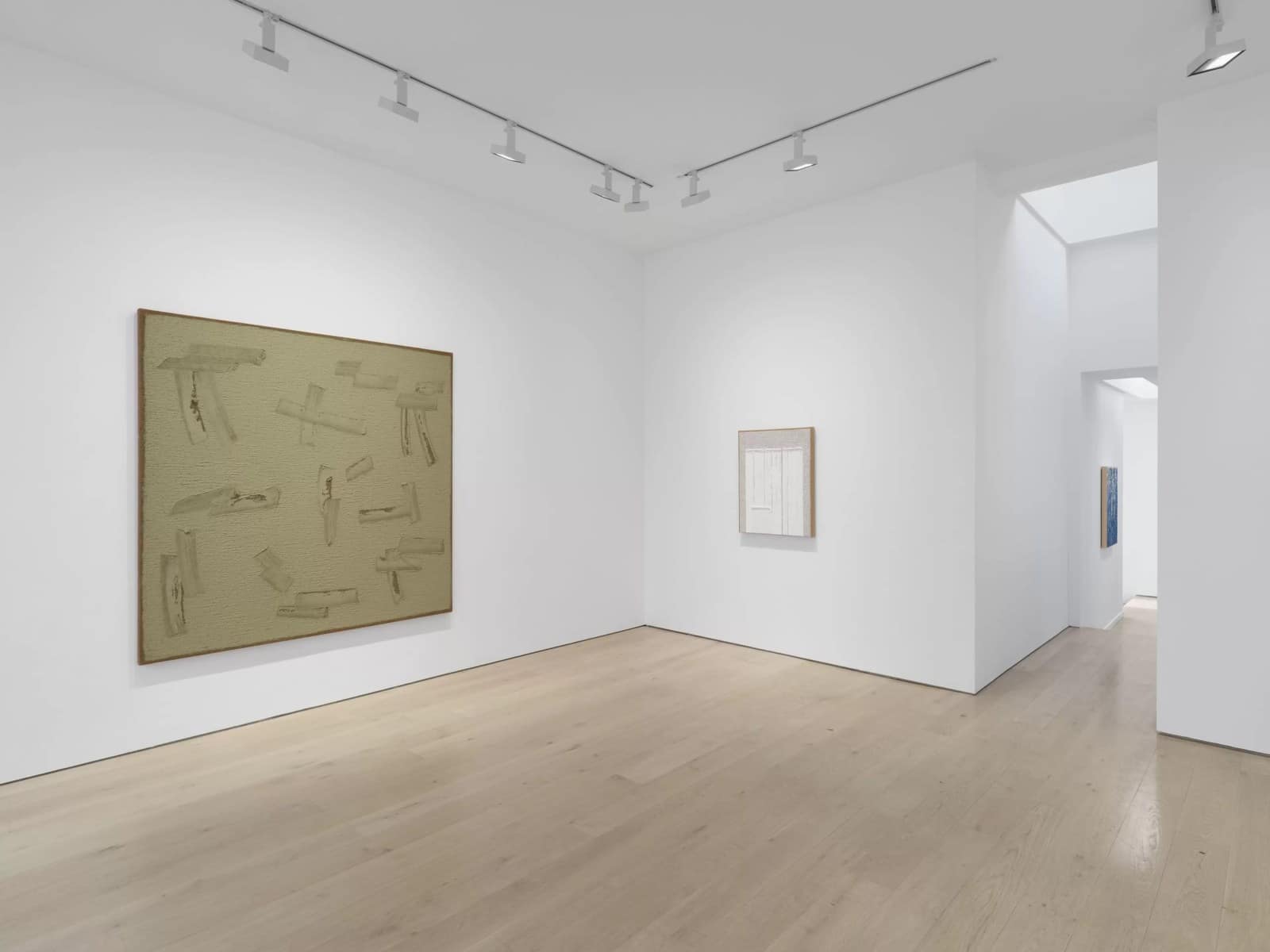 A large olive-green Ha Chong-Hyun Conjunction painting and a small white work in a Lisson gallery room