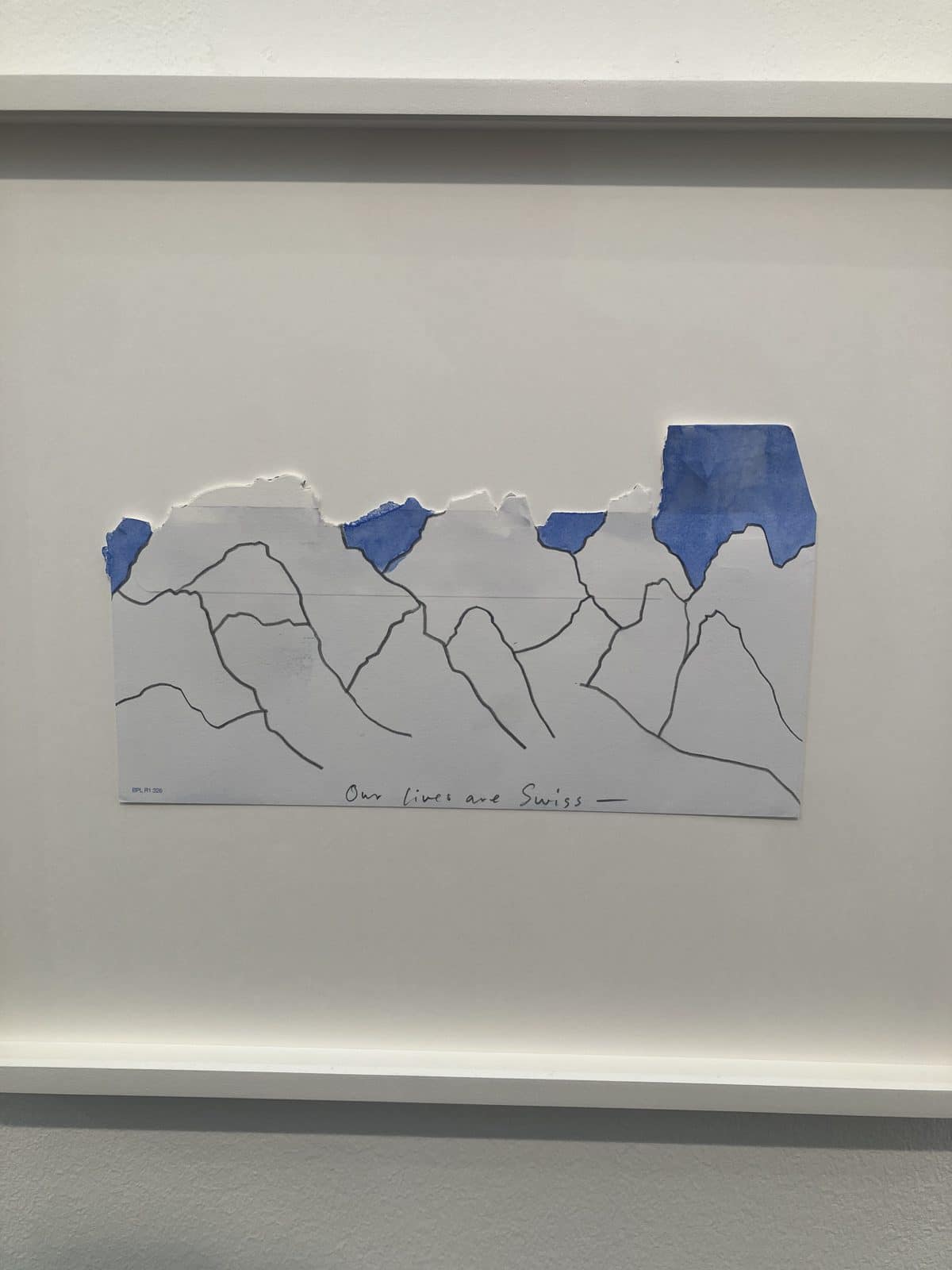 Spencer Finch envelope torn into a mountain range with blue peaks