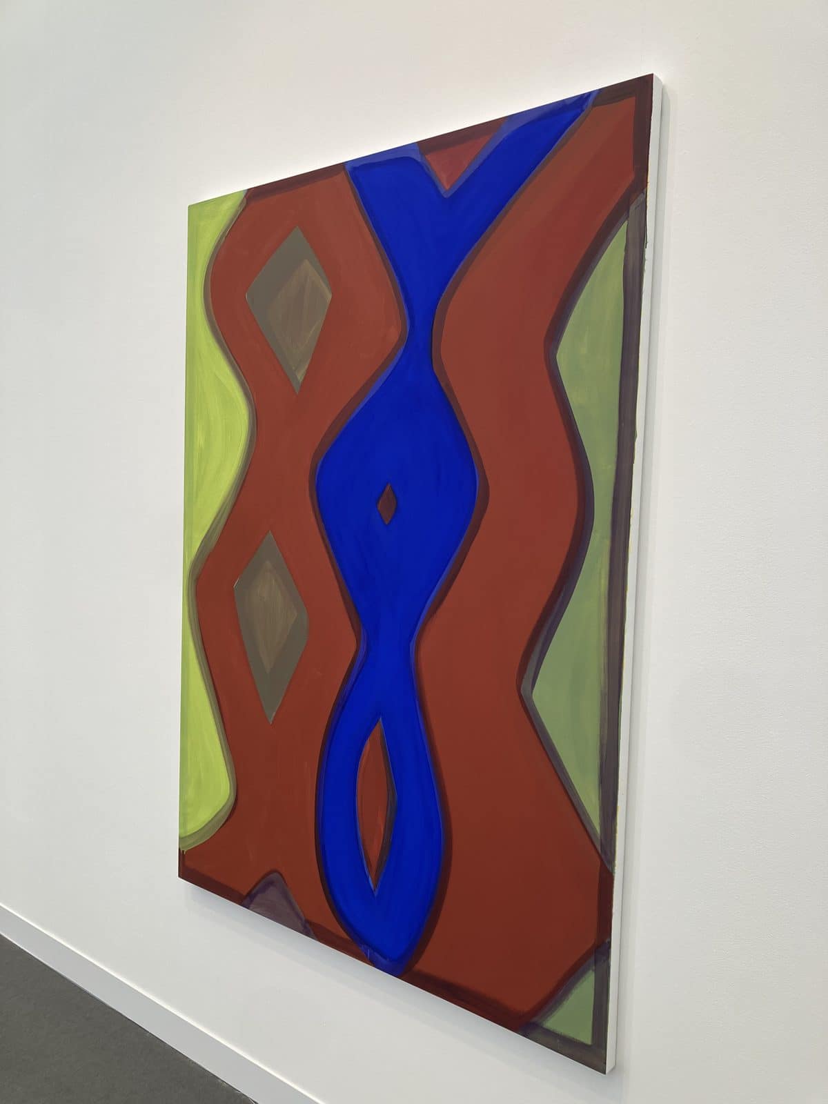 Marina Adams ReWild, a cobalt zigzag through rust and lime green
