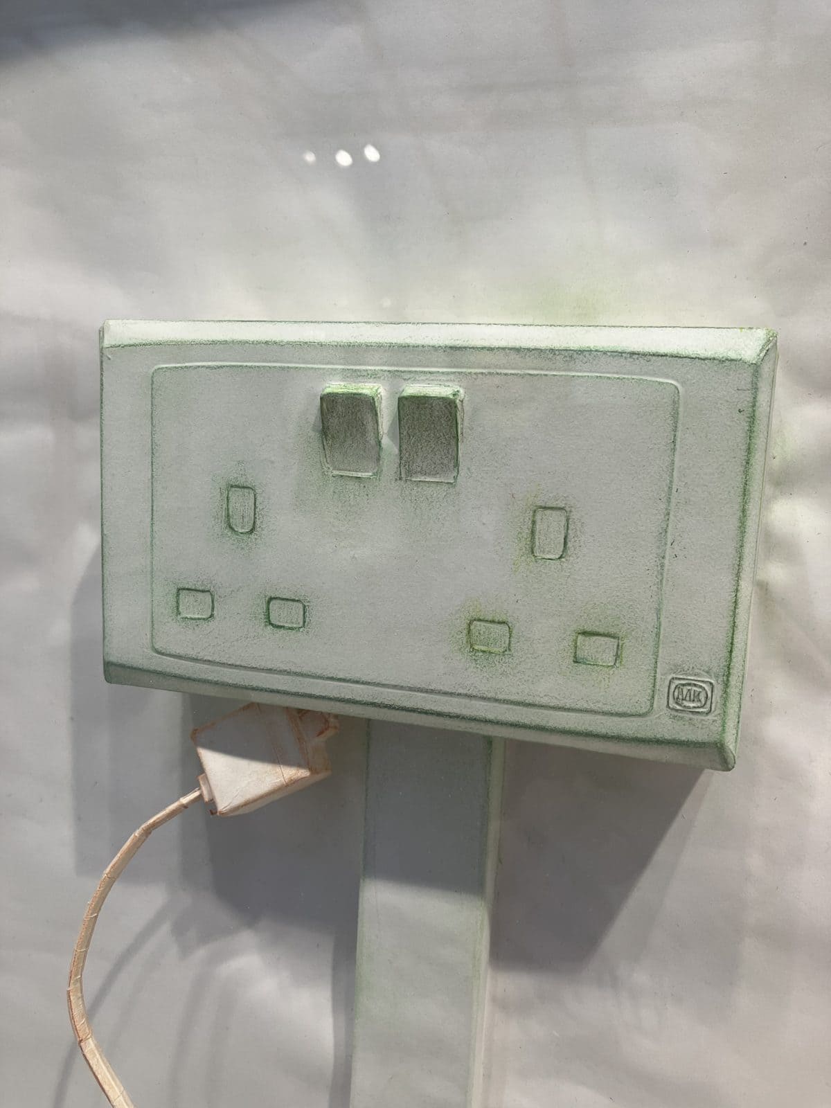 Do Ho Suh pastel rubbing of a UK plug socket with a cable, framed