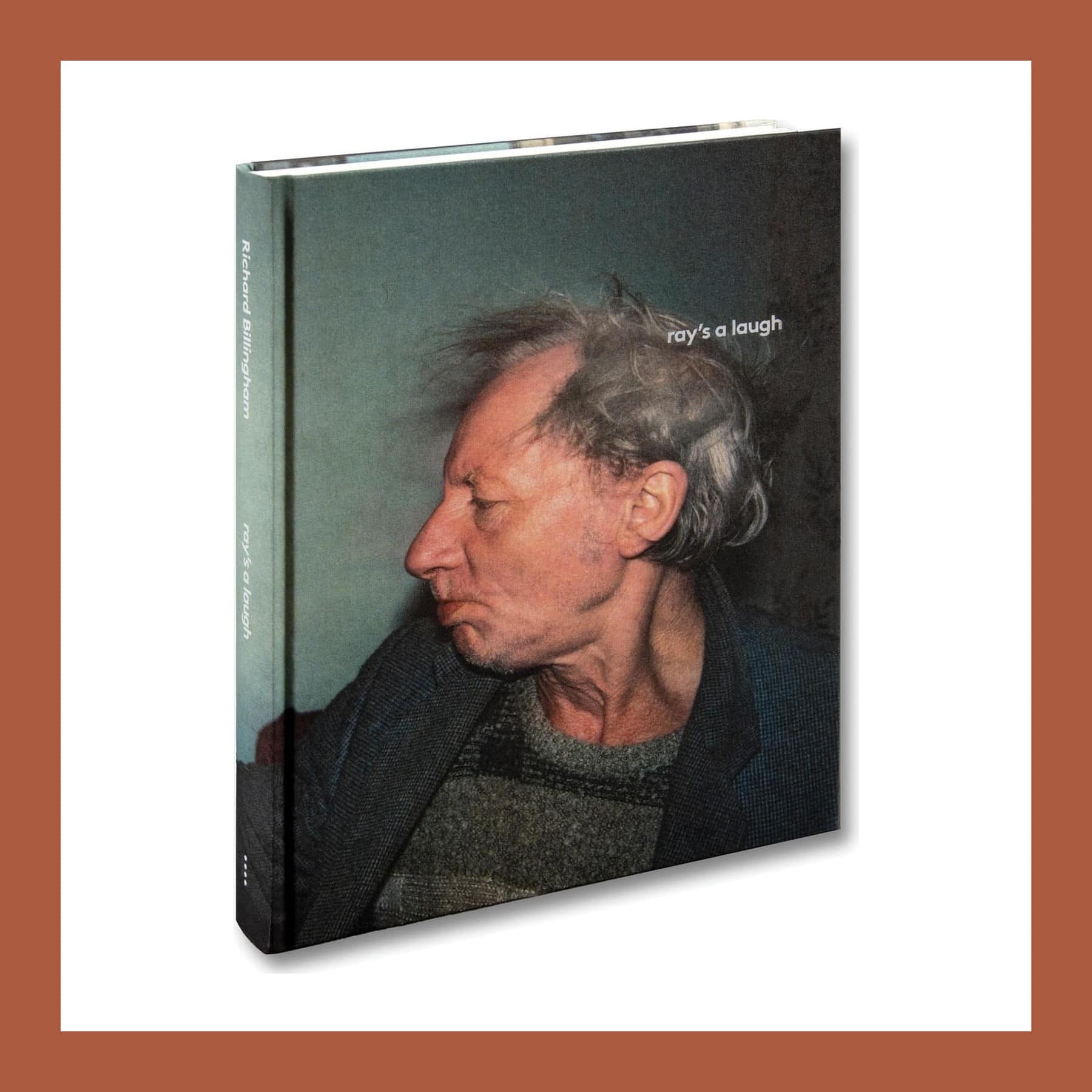 Hardback book Ray's a Laugh, with a cover photo of an older man in profile with tousled grey hair
