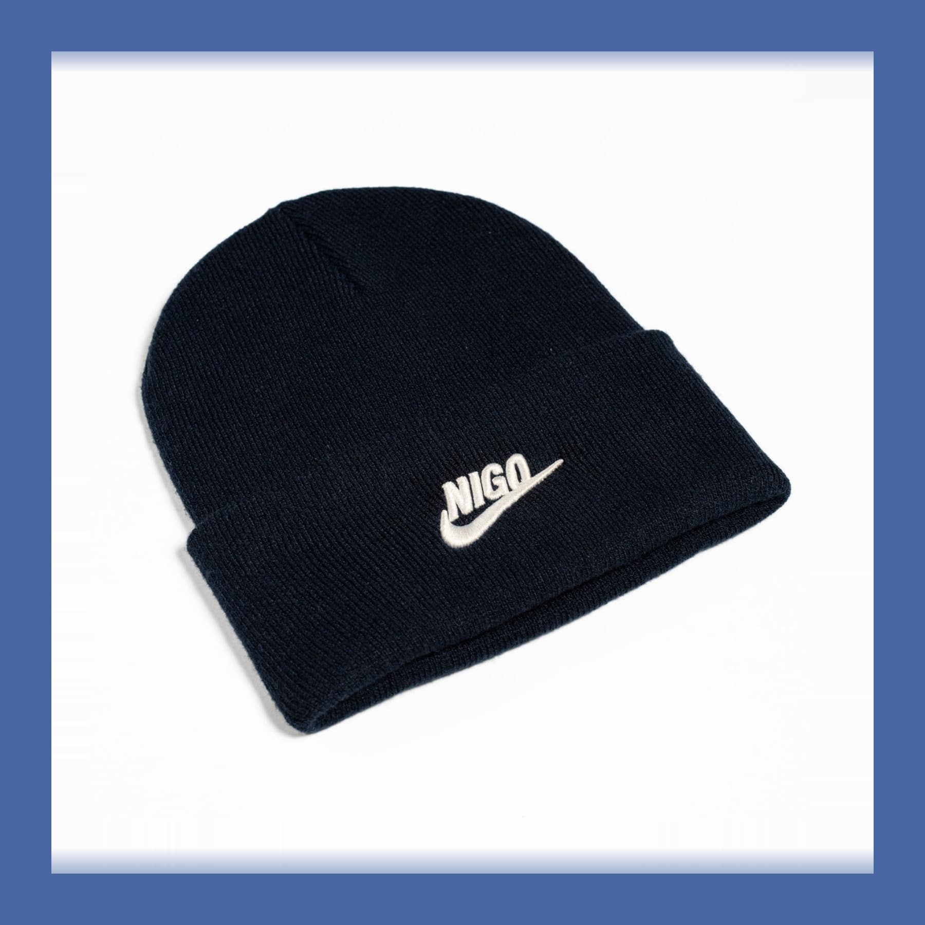 Black NIGO x Nike beanie with the Nike swoosh and NIGO in white on the turn-up.