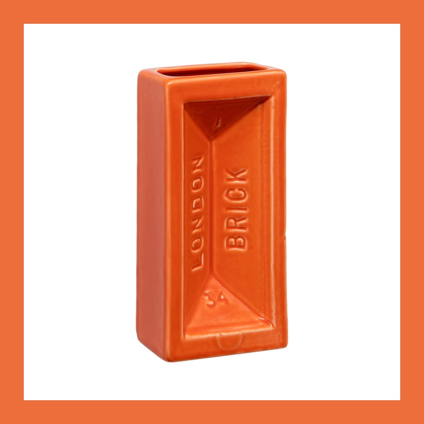 Stolen Form London Brick Vase in orange gloss ceramic, moulded from a London stock brick, on a white background