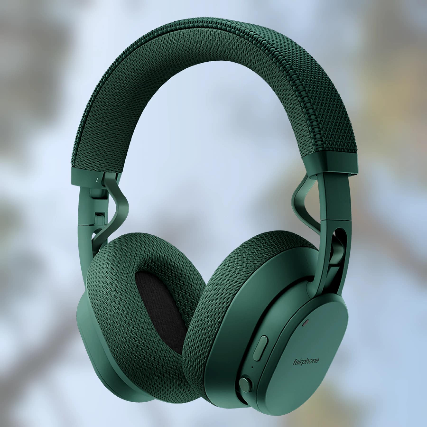 Fairphone Fairbuds XL headphones in Forest Green showing mesh headband and ear cushions