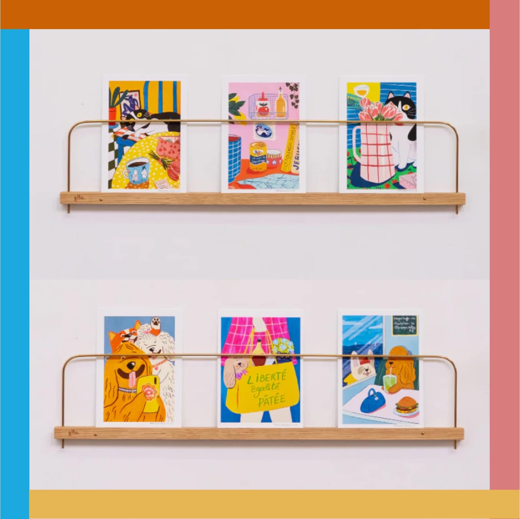 Two Gllu postcard shelves, one holding three Mary Gribouille dog cards and one holding three cat cards