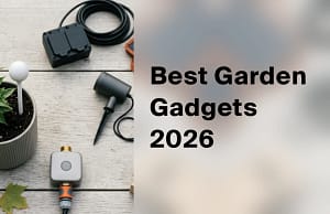 Flat lay of garden gadgets including a plant sensor, tap timer, solar panel and outdoor lighting