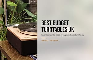 Majority Folio record player playing a record beside houseplants, under the headline Best Budget Turntables UK