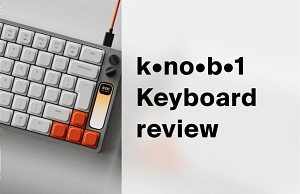 Work Louder Knob1 keyboard from above, silver aluminium body with orange accent keys, two dials and a vertical strip display