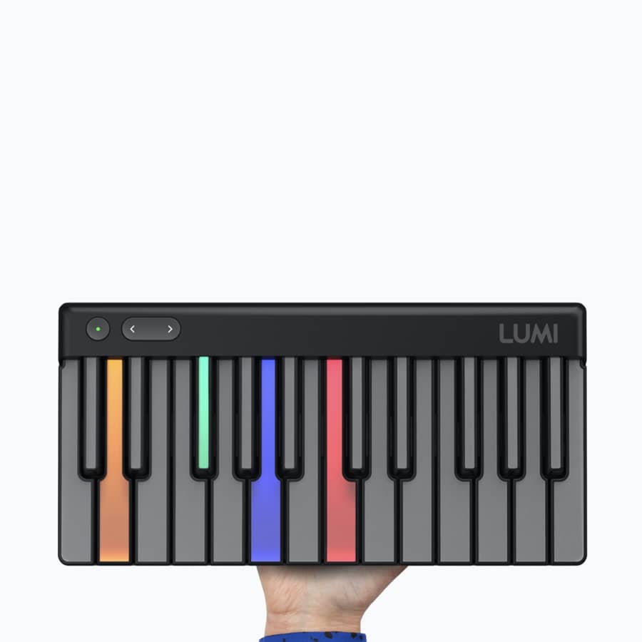 lumi keys keyboard held in a hand