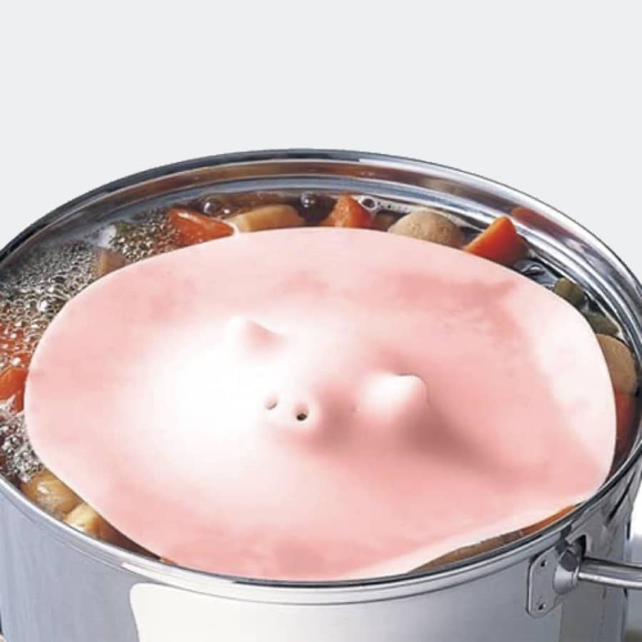 The piggy steamer atop a stew