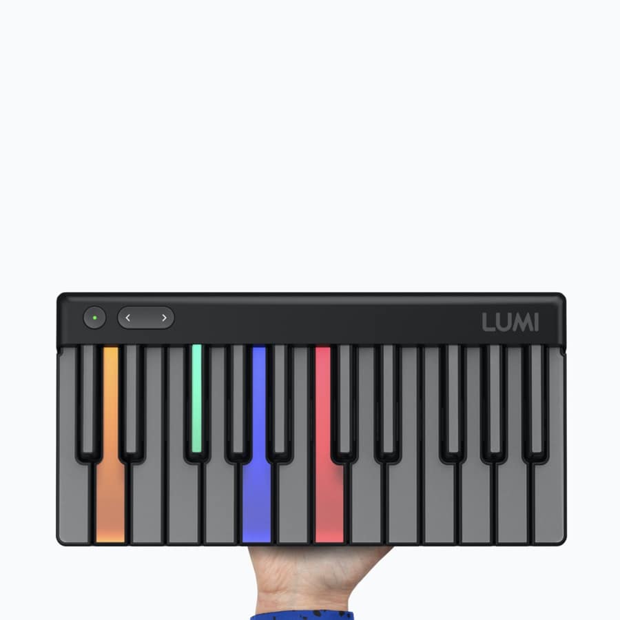lumi keys keyboard held in a hand