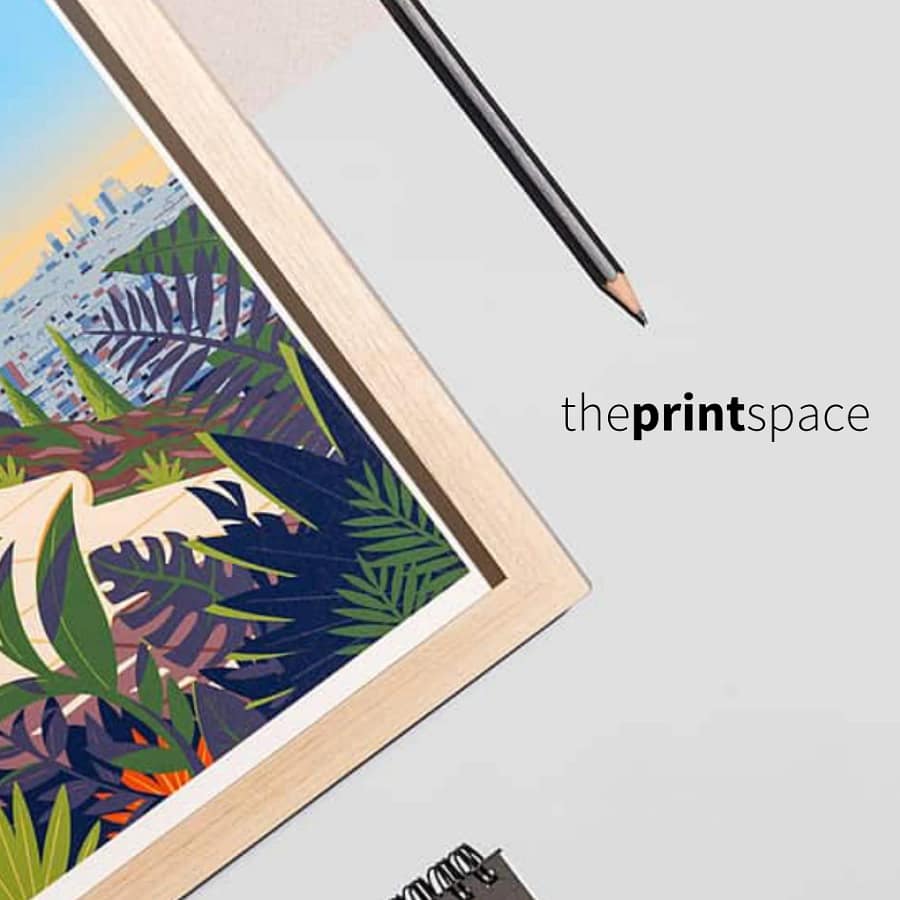 Framed colourful art print on a desk showing theprintspace’s professional print quality for our theprintspace discount code guide