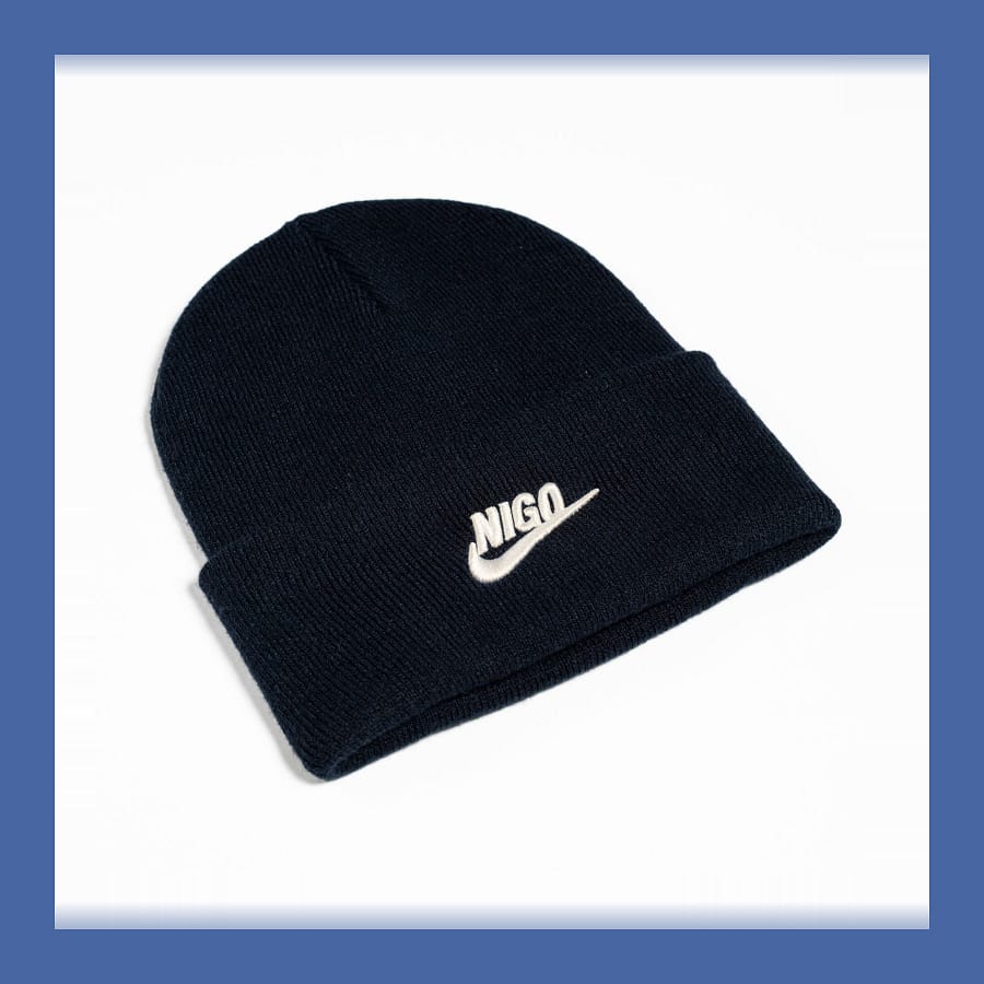 Black NIGO x Nike beanie with the Nike swoosh and NIGO in white on the turn-up.