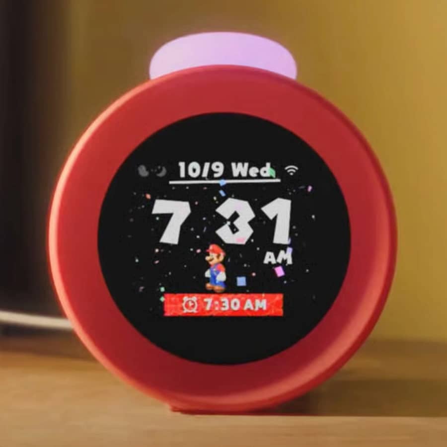 Nintendo Alarmo Alarm Clock with Mario display on wooden bedside table