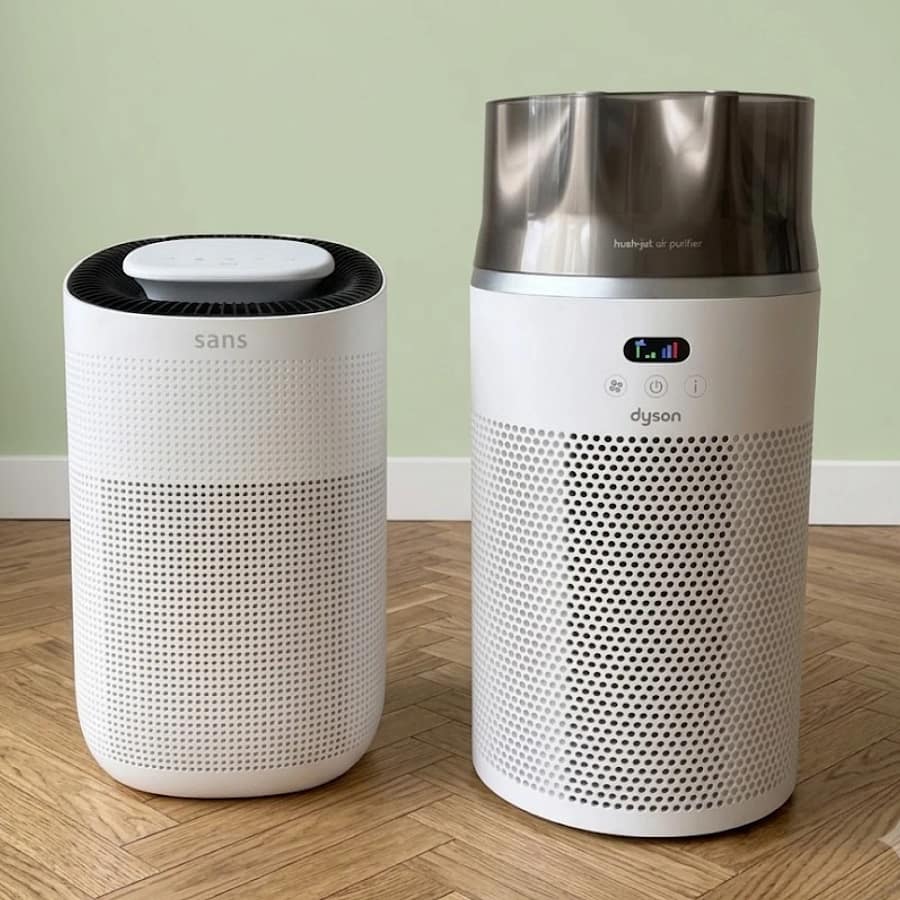 Dyson HushJet vs Sans Mini air purifiers side by side on a wooden floor