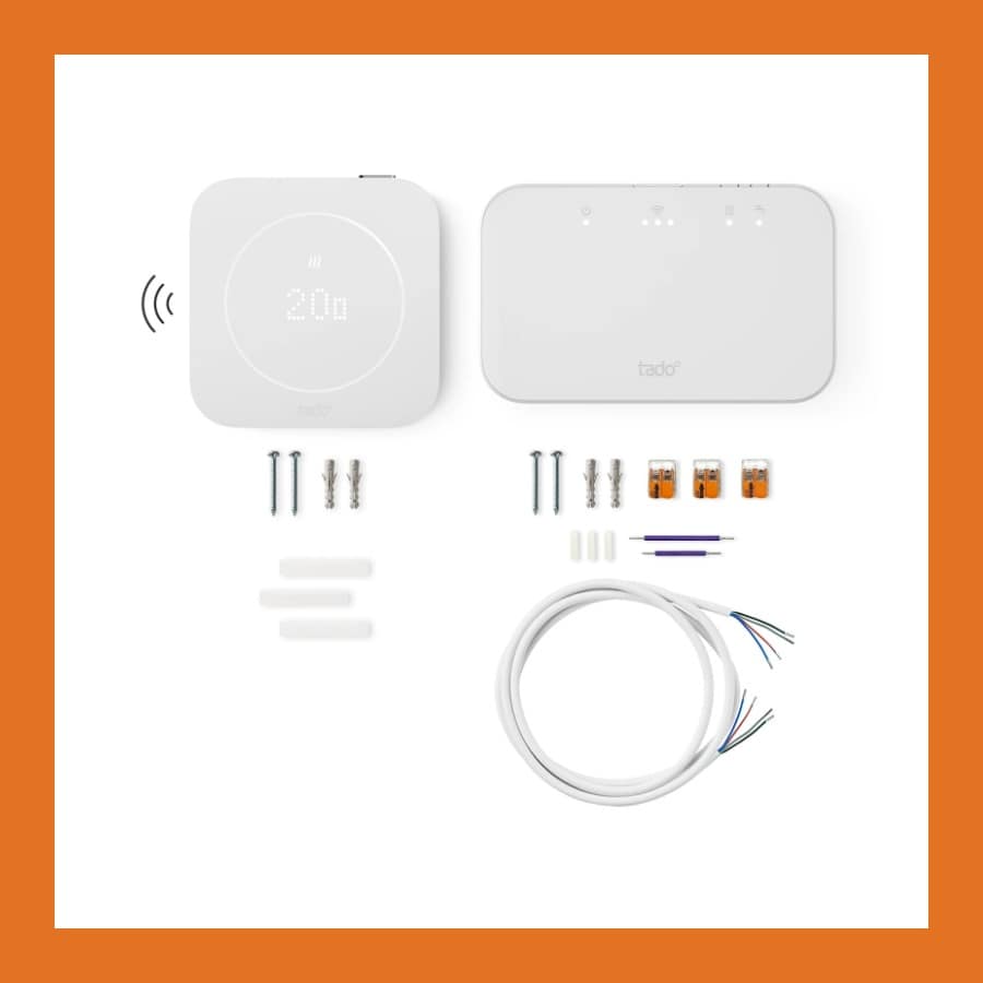 Flat lay of the tado Smart Thermostat X starter kit contents, screws, wall plugs, connectors and installation cable