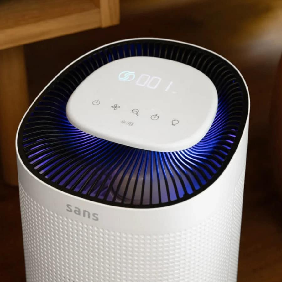 Sans Air Purifier Mini from above with its blue LED ring and display lit up