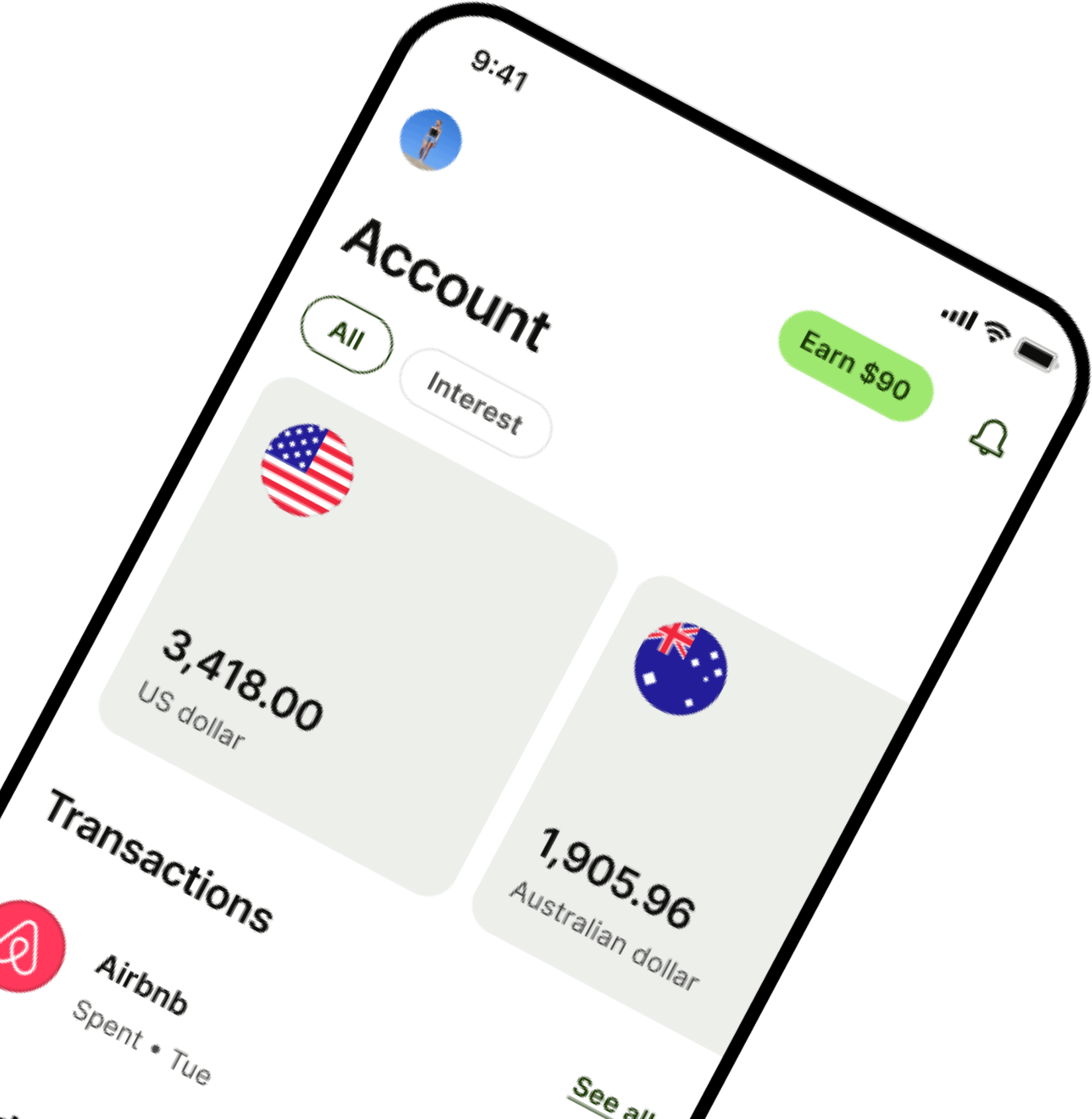 Wise app at an angle showing US dollar and other currency balances for travel